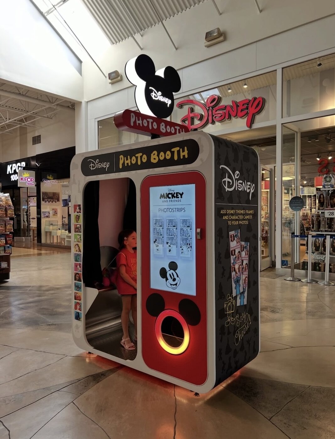 Photo booth installed at an indoor shopping mall storefront